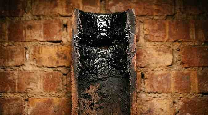 creosote buildup inside a chimney flue